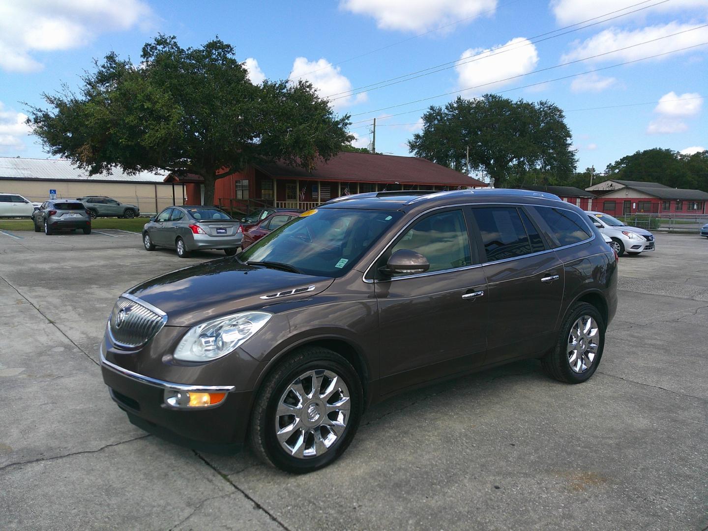 2012 BROWN BUICK ENCLAVE PREMIUM (5GAKRDED3CJ) , located at 1200 Cassat Avenue, Jacksonville, FL, 32205, (904) 695-1885, 30.302404, -81.731033 - Photo#1